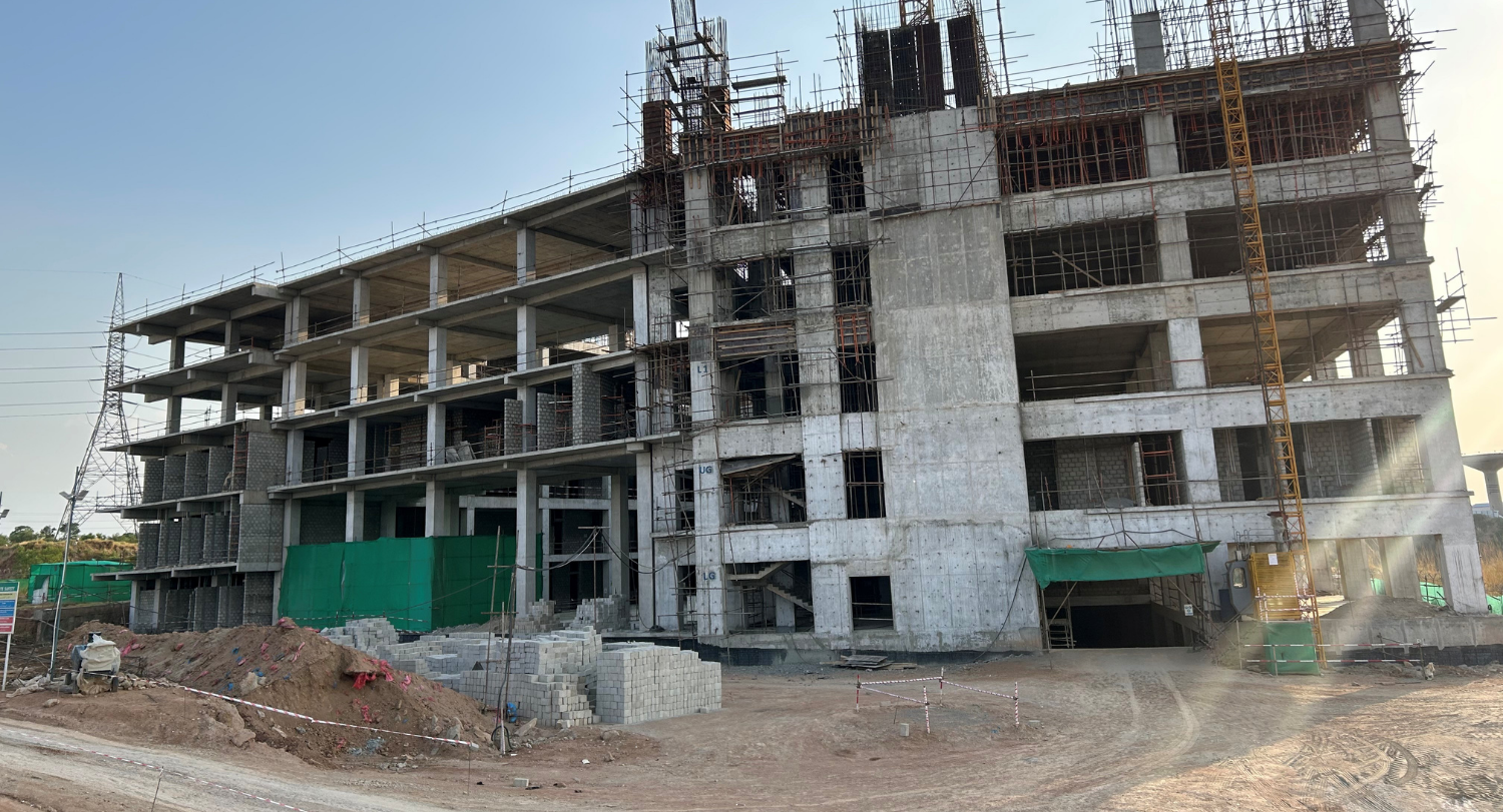 A wide view of the Novacare Hospital Islamabad construction site in June 2025