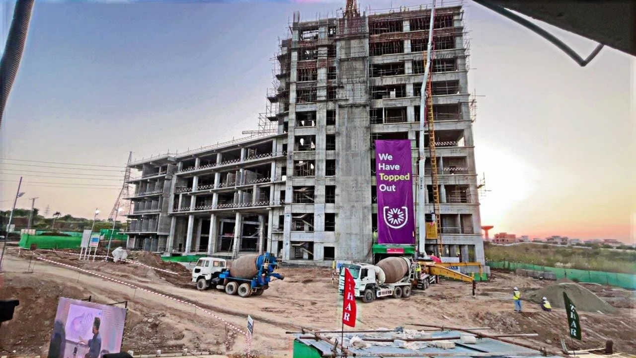 The topped out grey structure of Novacare Hospital Islamabad