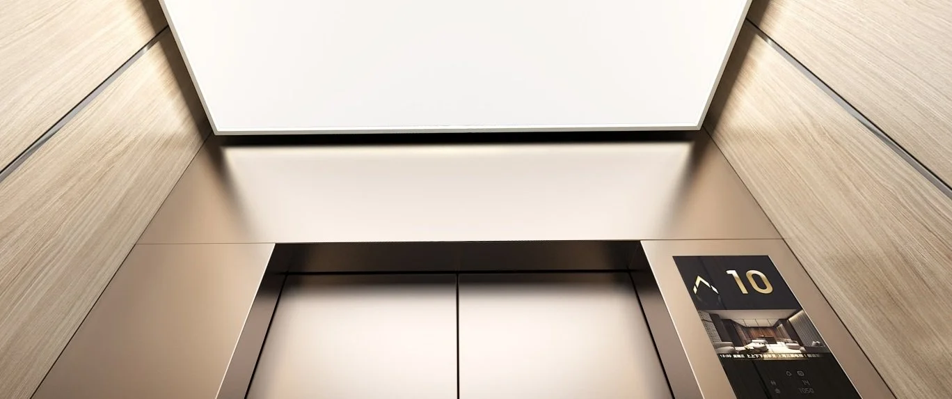 The inside of an elevator car with its floor display